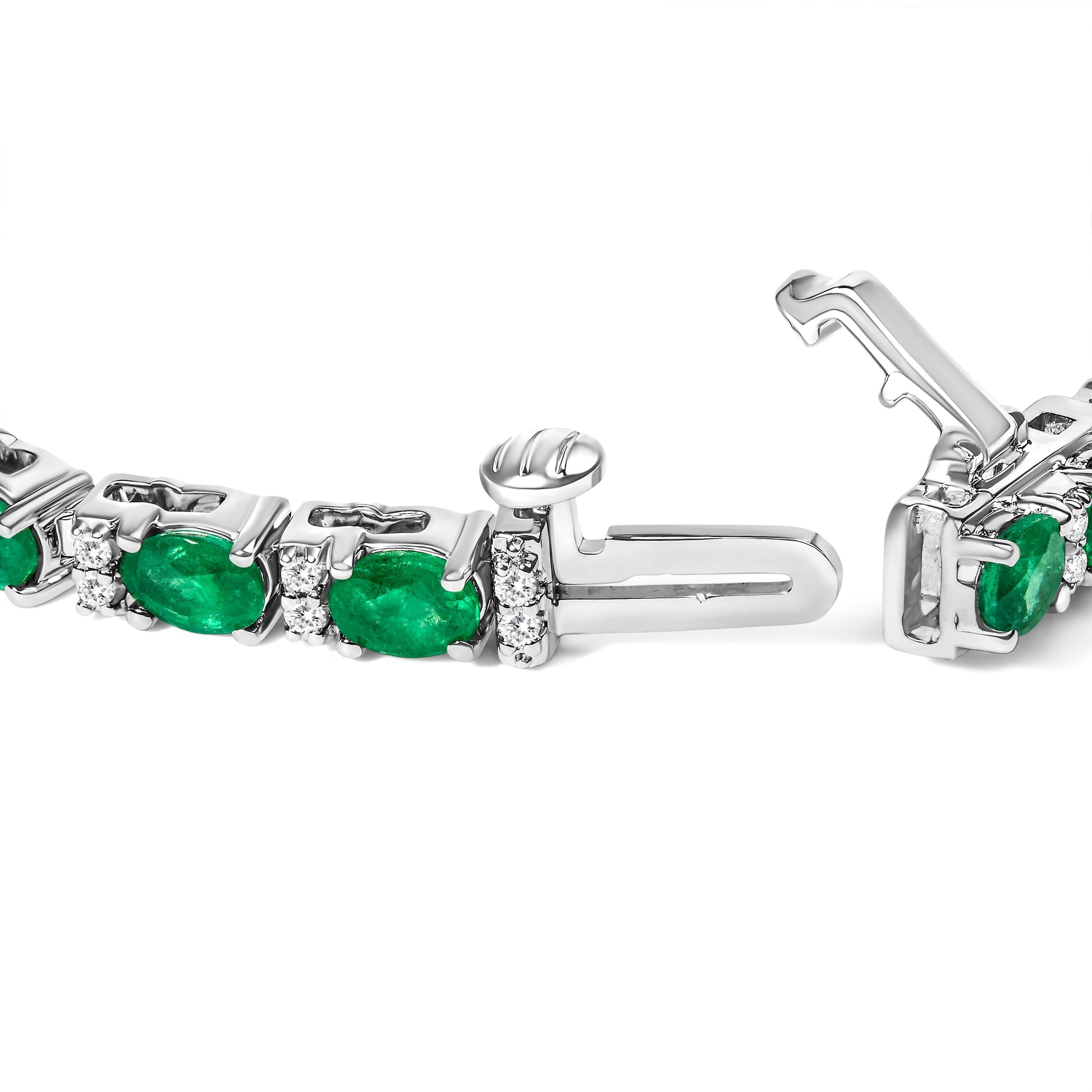 14K White Gold Alternating Oval Green Emerald and Diamond Tennis Bracelet Bids.com