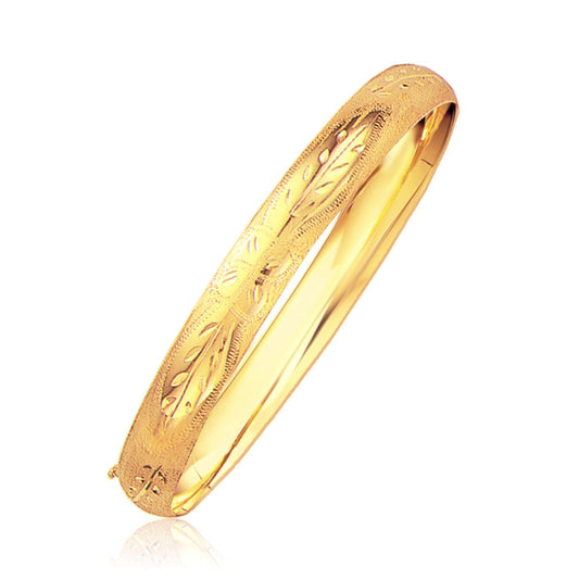 Classic Floral Carved Bangle in 14k Yellow Gold (8.0mm) Bids.com