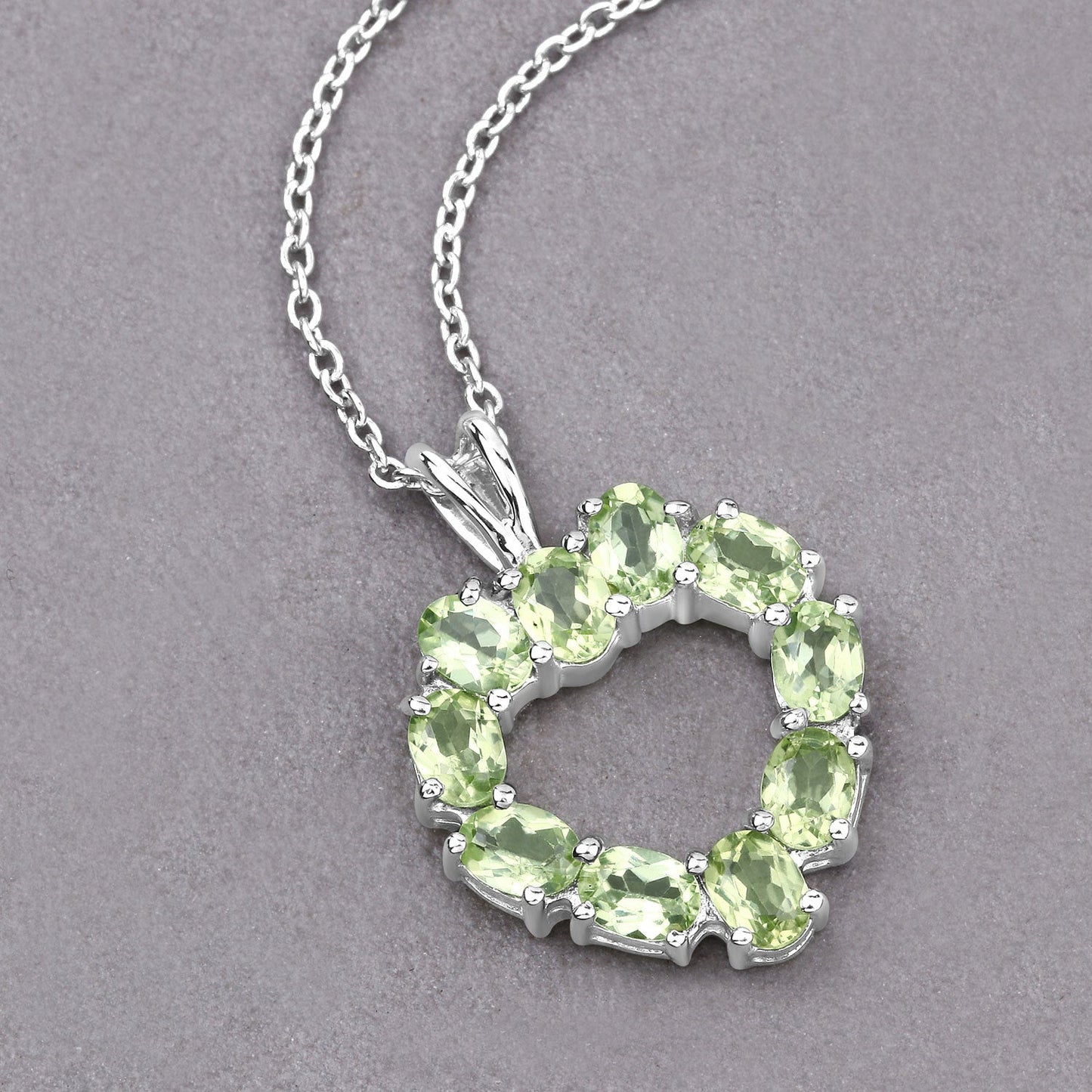 1.70 Carat Genuine Peridot .925 Sterling Silver Pendant Bids.com