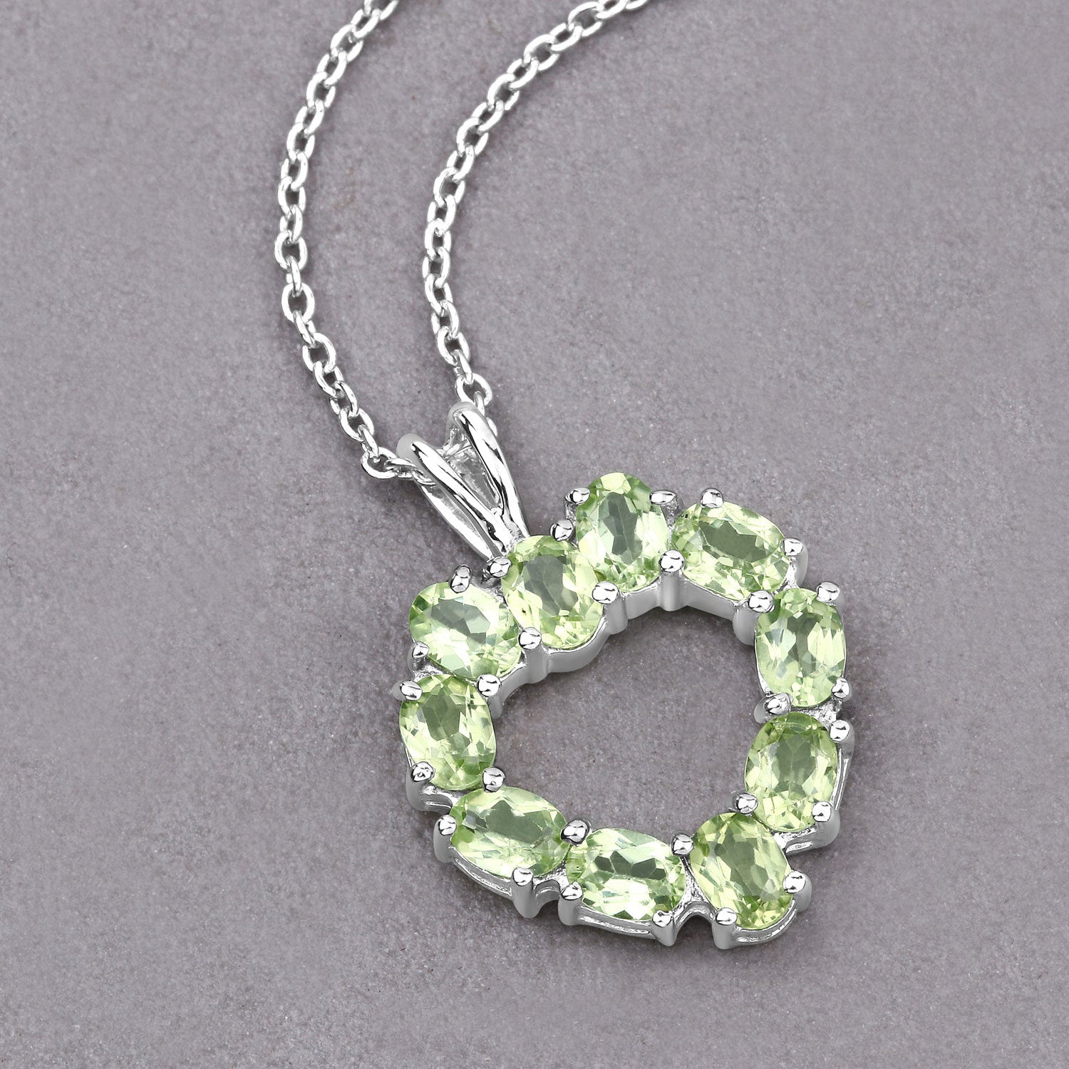1.70 Carat Genuine Peridot .925 Sterling Silver Pendant Bids.com