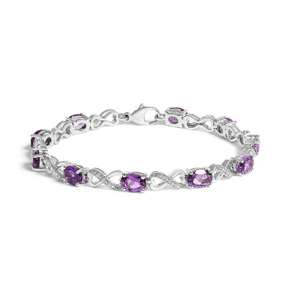 .925 Sterling Silver Oval Purple Amethyst and Diamond Infinity Link Bracelet (I-J Color, I1-I2 Clarity) - 7" Inches Bids.com