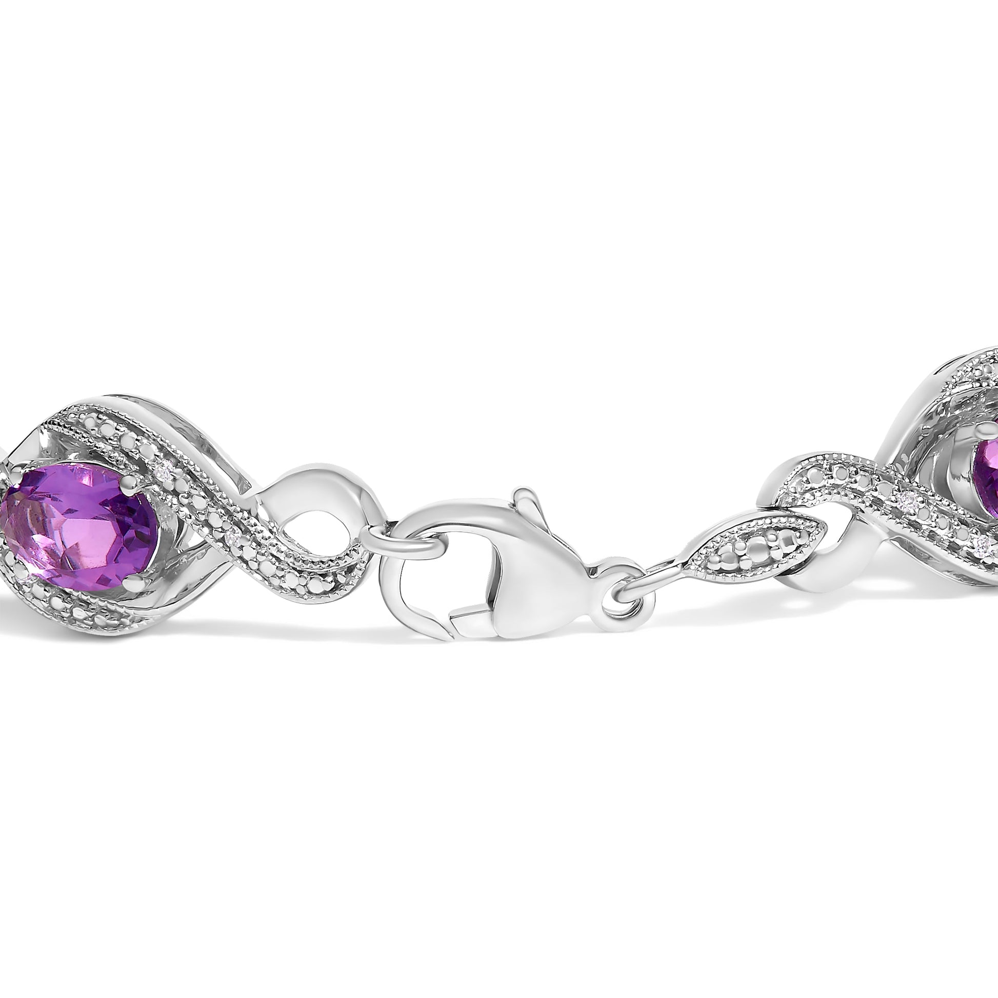 .925 Sterling Silver 1/10 Cttw Natural Round Diamond and 7X5MM Oval Amethyst Cross Tennis Bracelet (I-J Color, I1-I2 Clarity) - 7" Bids.com