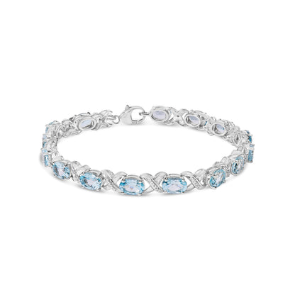 .925 Sterling Silver 16.0 Cttw Oval Blue Topaz and Diamond Accent Tennis X Link Bracelet (I-J Color, I1-I2 Clarity) - Size 7" Inch Bids.com