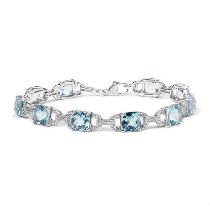 .925 Sterling Silver 7x7 mm Cushion Cut Blue Topaz and 1/20 cttw Round Cut Diamond Fashion Tennis Bracelet (I-J Color, I1-I2 Clarity) - 7" Bids.com