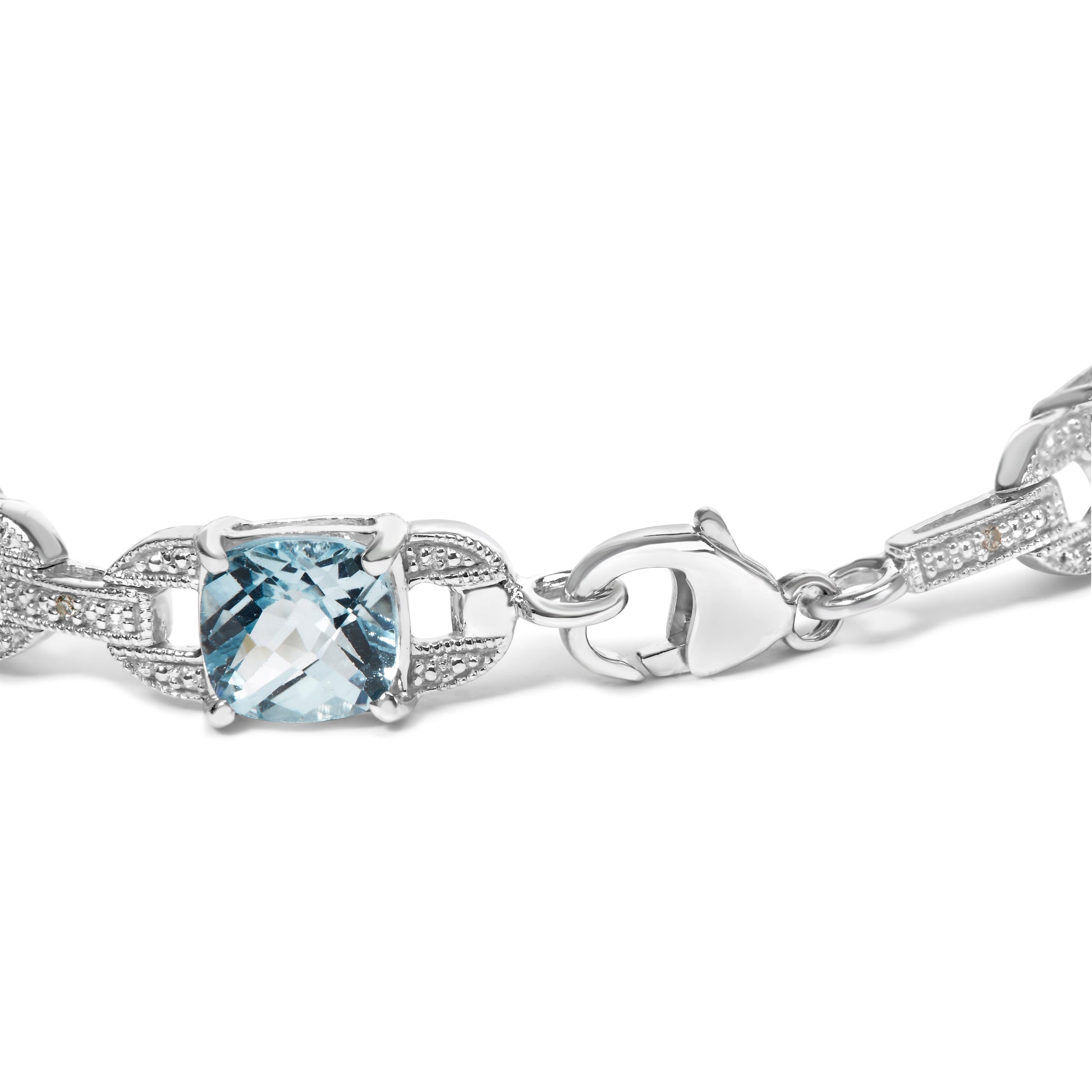 .925 Sterling Silver 7x7 mm Cushion Cut Blue Topaz and 1/20 cttw Round Cut Diamond Fashion Tennis Bracelet (I-J Color, I1-I2 Clarity) - 7" Bids.com