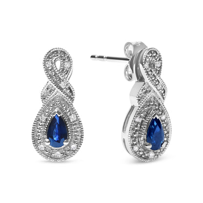 .925 Sterling Silver 4.5 x 3mm Pear Sapphire Gemstone and Diamond Accent Infinity Drop Stud Earrings (H-I Color, SI1-SI2 Clarity) Bids.com