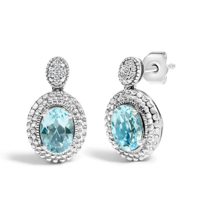 .925 Sterling Silver Diamond Accent and  Oval Blue Topaz with Beaded Halo Drop Stud Earrings (I-J color, I1-I2 Clarity) Bids.com
