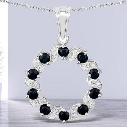 1.30 Carat Genuine Blue Sapphire and White Topaz .925 Sterling Silver Pendant Bids.com