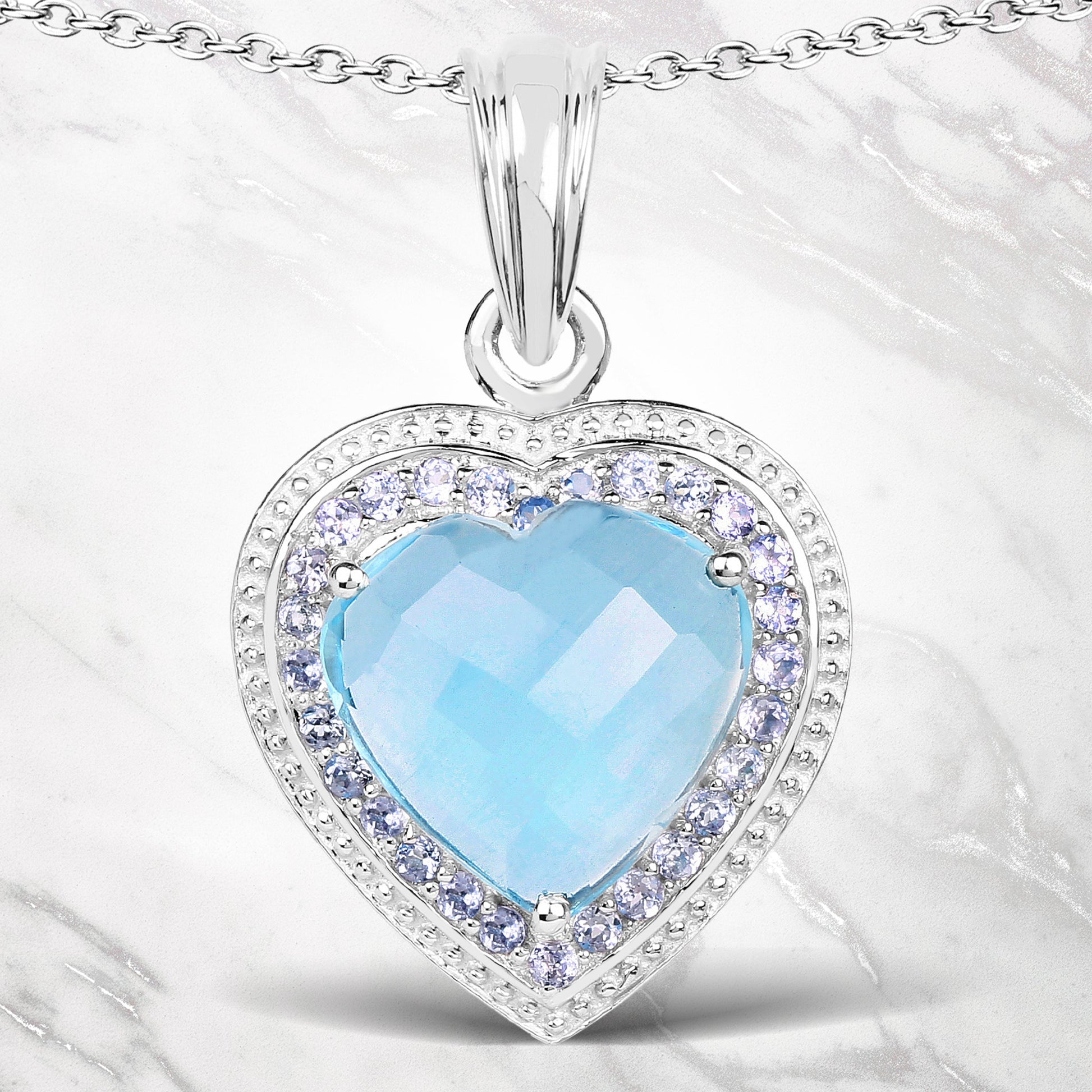 7.36 Carat Genuine Blue Topaz and Tanzanite .925 Sterling Silver Pendant Bids.com