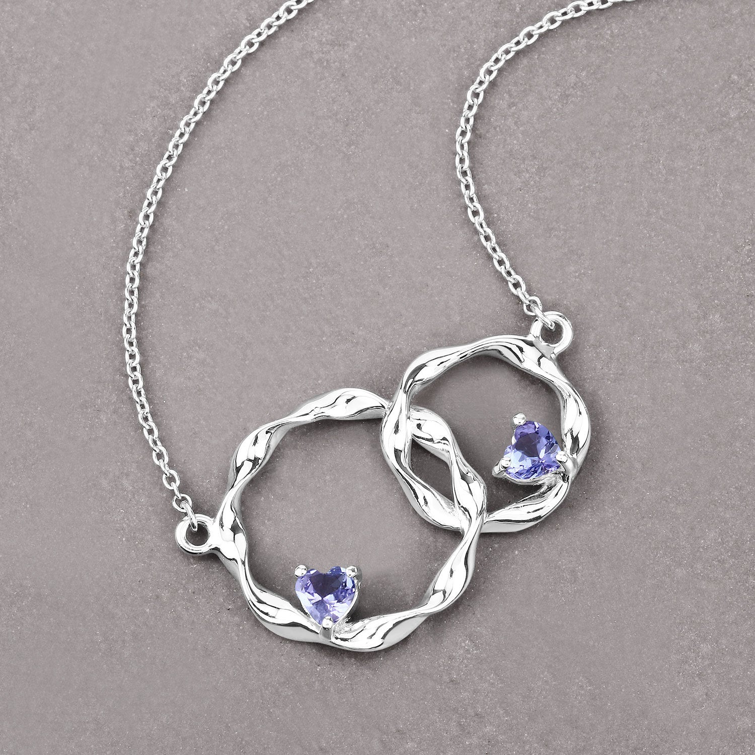 0.38 Carat Genuine Tanzanite .925 Sterling Silver Pendant Bids.com