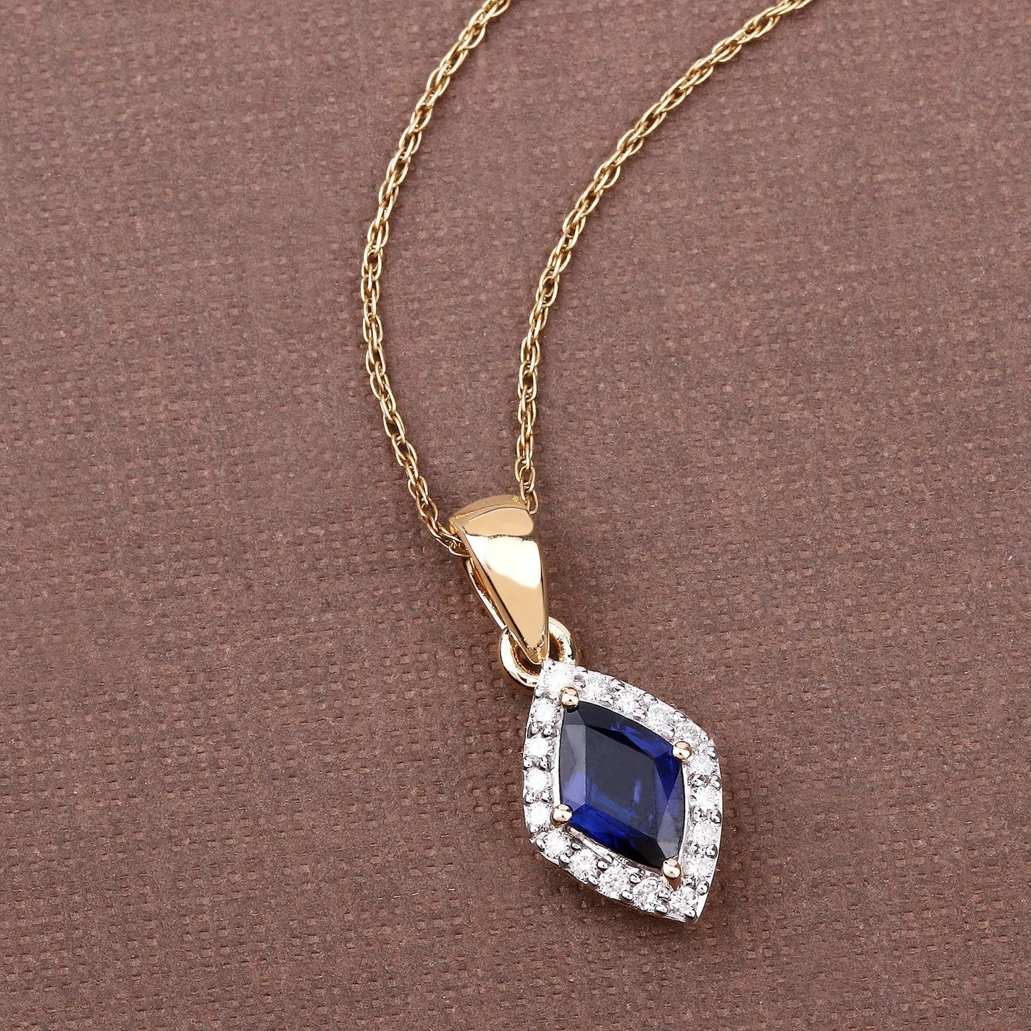 0.92 Carat Genuine Blue Sapphire and White Diamond 14K Yellow Gold Pendant Bids.com