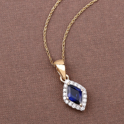 0.92 Carat Genuine Blue Sapphire and White Diamond 14K Yellow Gold Pendant Bids.com