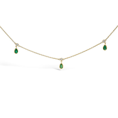 10K Yellow Gold Dangling 5x3 mm Green Emerald and Diamond Station Necklace - 18" Inches Bids.com