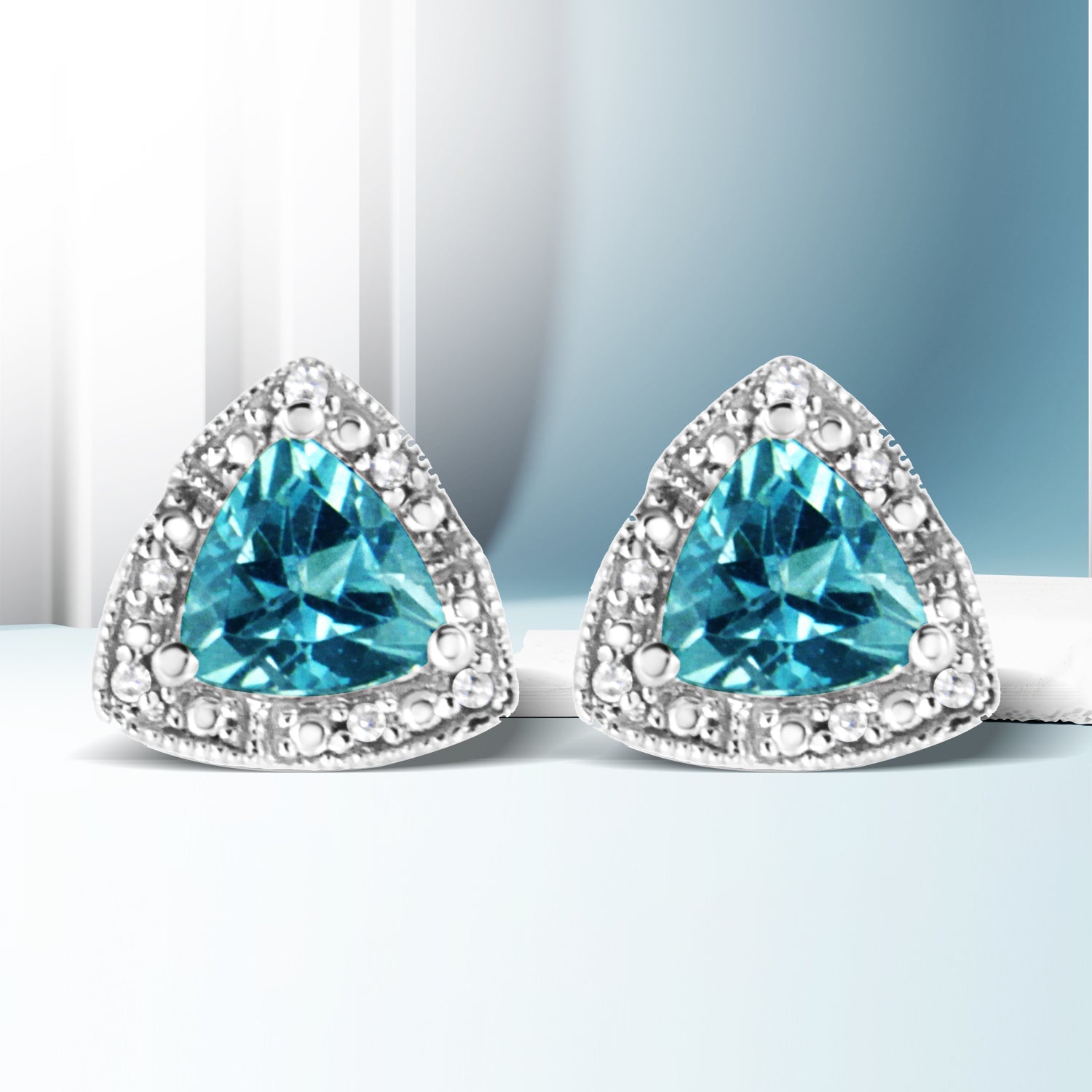 .925 Sterling Silver 6x6 mm Trillion Cut Blue Topaz Gemstone and Diamond Accent Stud Earring (I-J Color, I1-I2 Clarity) Bids.com