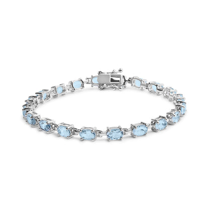 .925 Sterling Silver 11.0 Cttw Oval Shaped Created Light Blue Topaz Link Bracelet - 7 inch Bids.com
