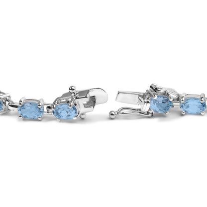 .925 Sterling Silver 11.0 Cttw Oval Shaped Created Light Blue Topaz Link Bracelet - 7 inch Bids.com
