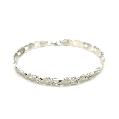 14k White Gold Heart Shape Textured Bracelet Bids.com