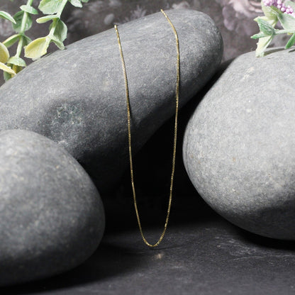 14k Yellow Gold Classic Box Chain 0.6mm Bids.com
