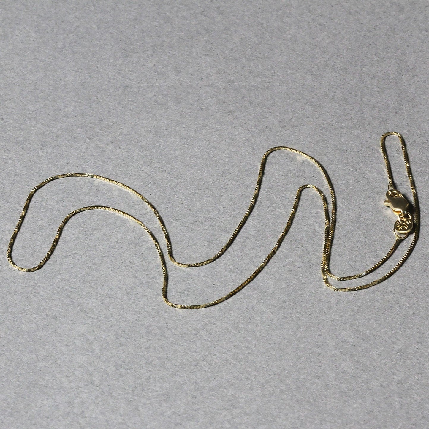 14k Yellow Gold Classic Box Chain 0.6mm Bids.com