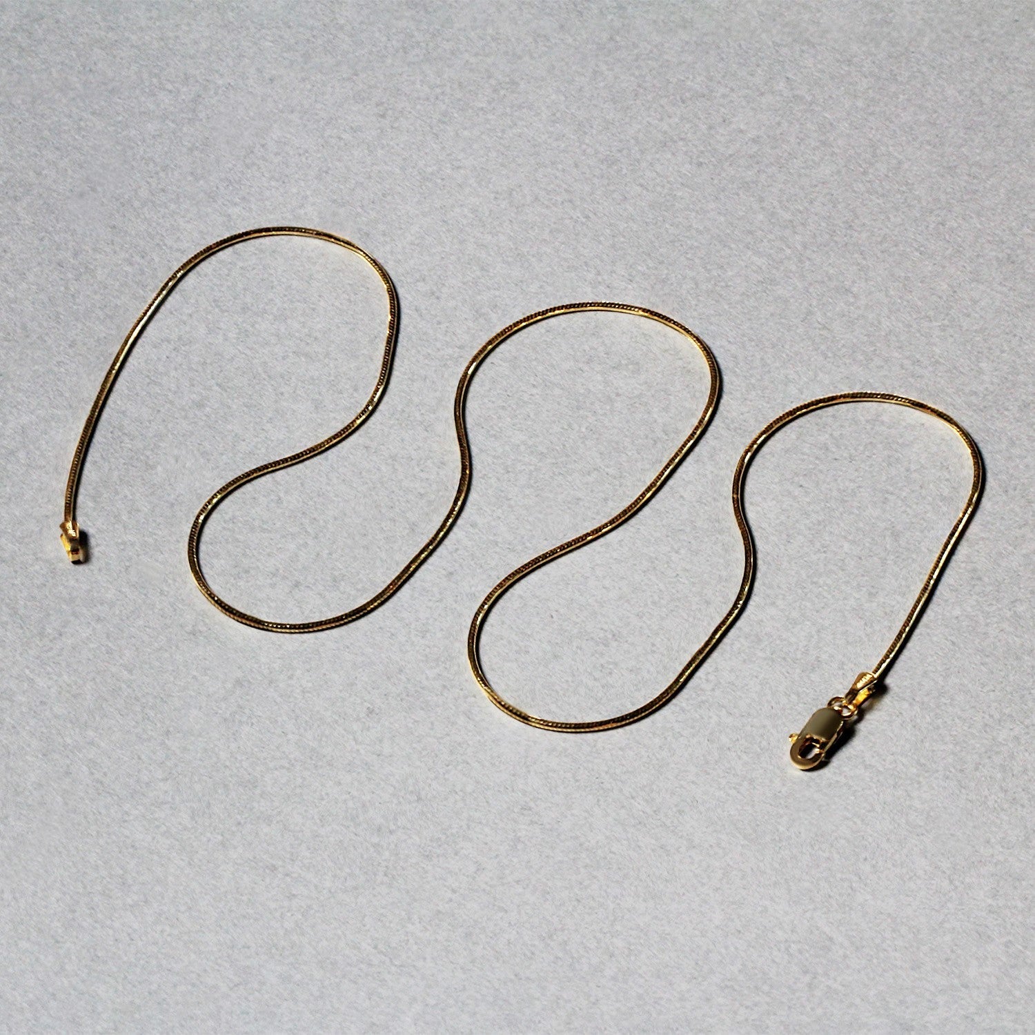 14k Yellow Gold Round Snake Chain 0.9mm Bids.com