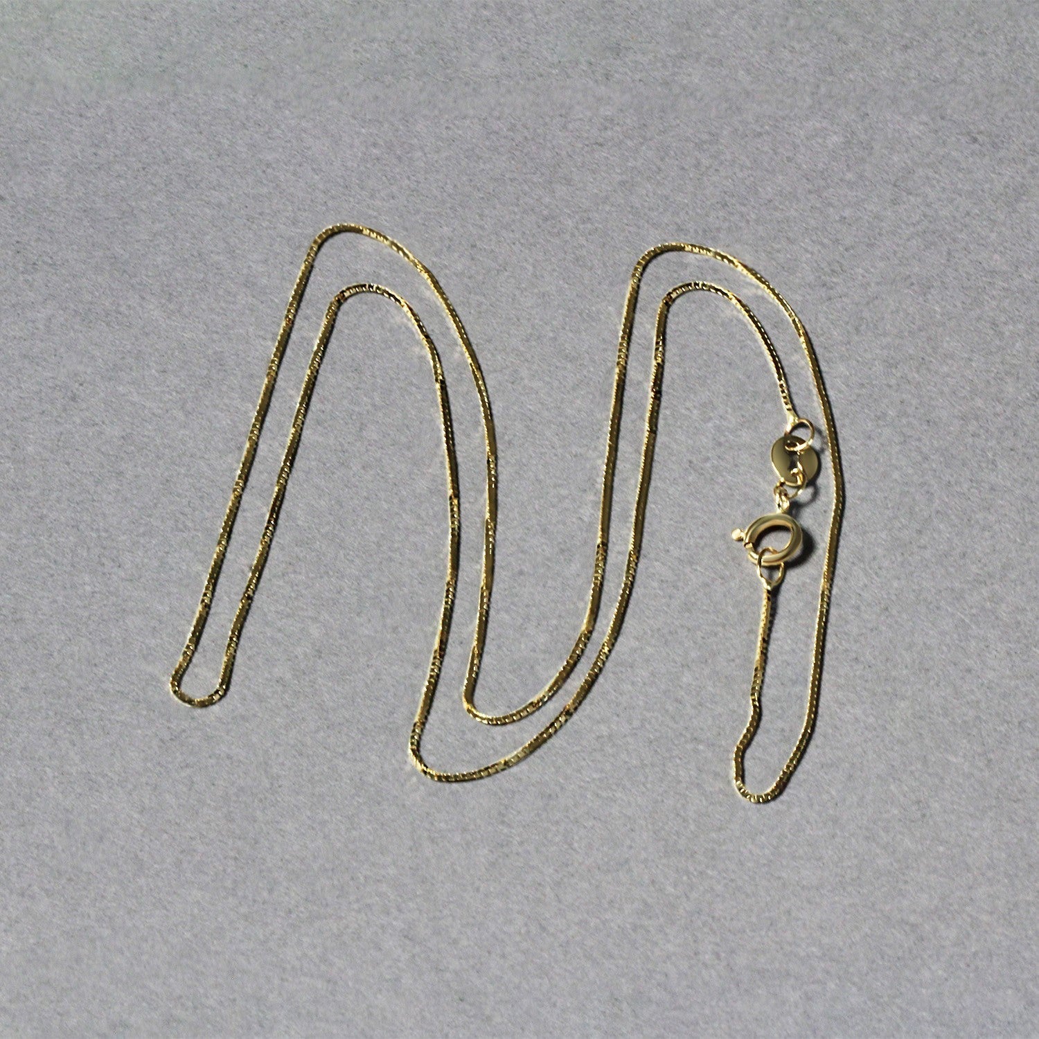 14k Yellow Gold Classic Box Chain 0.6mm Bids.com