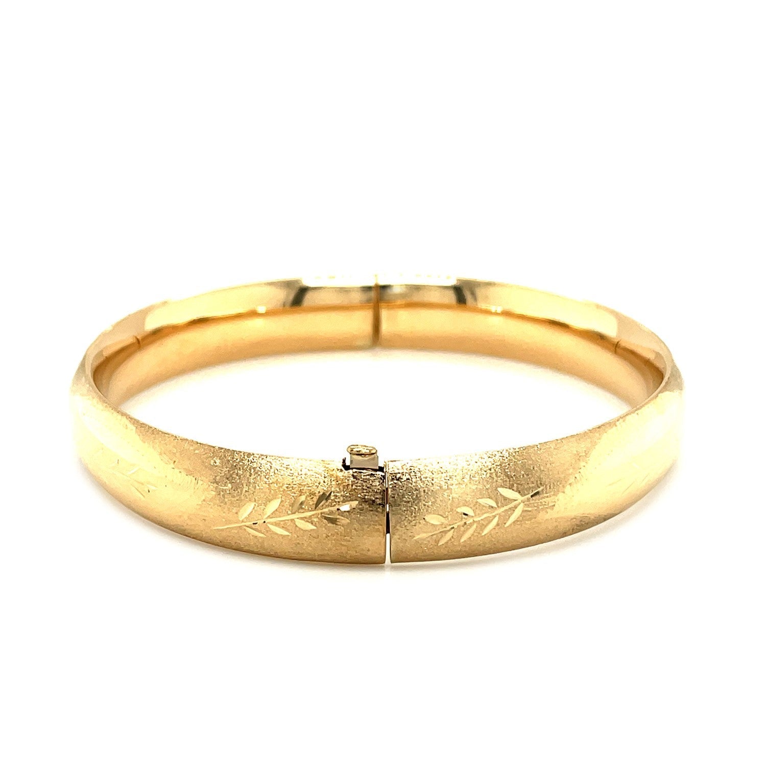 Classic Floral Carved Bangle in 14k Yellow Gold (10.0mm) Bids.com