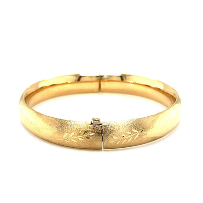 Classic Floral Carved Bangle in 14k Yellow Gold (10.0mm) Bids.com