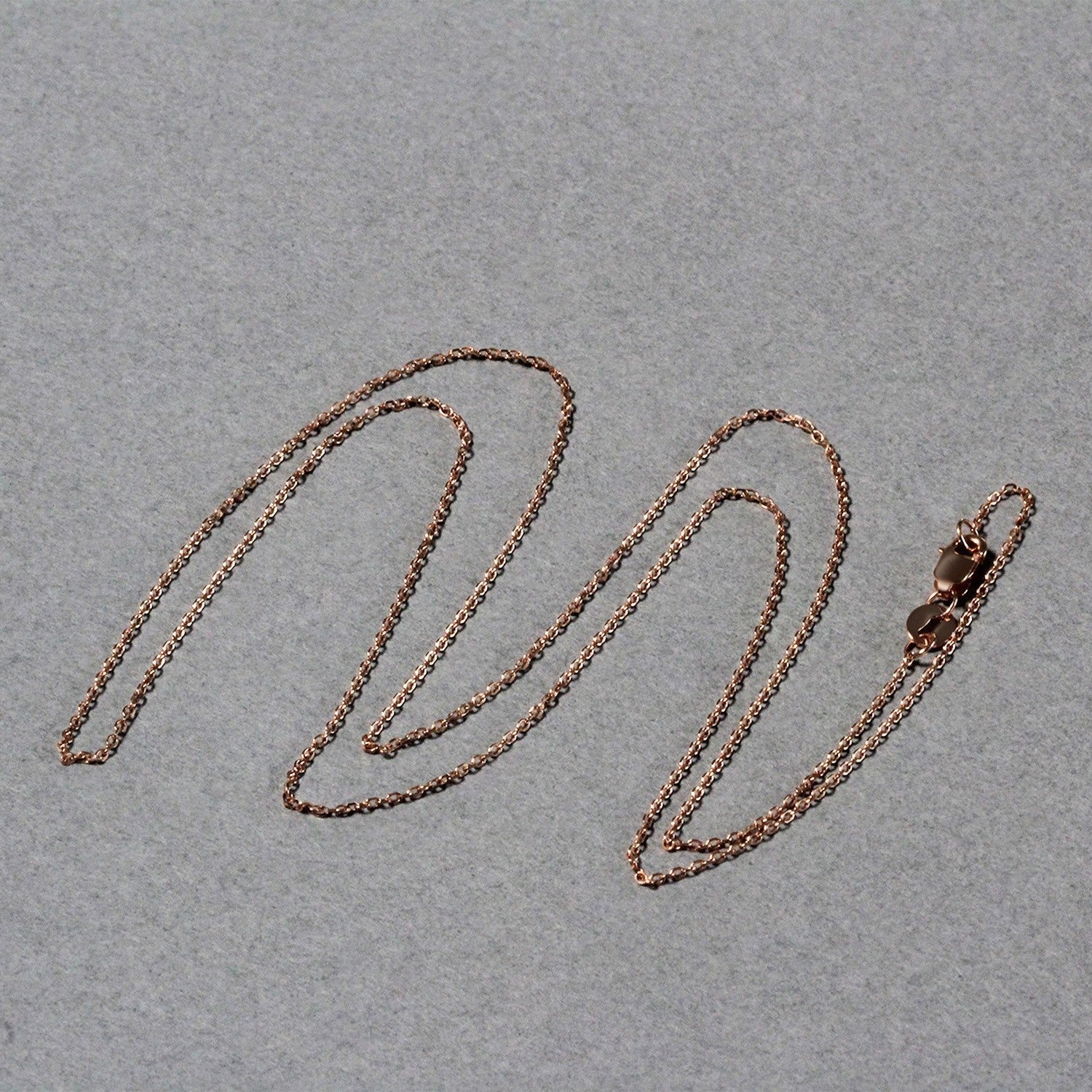 18k Rose Gold Diamond Cut Cable Link Chain (0.75 mm) Bids.com