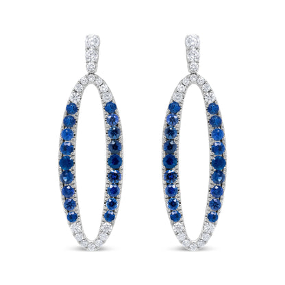 18K White Gold 1.11 Cttw Blue Round Diamond and Blue Sapphire Openwork Oval Shaped Dangle Earrings (F-G Color, VS1-VS2 Clarity) Bids.com