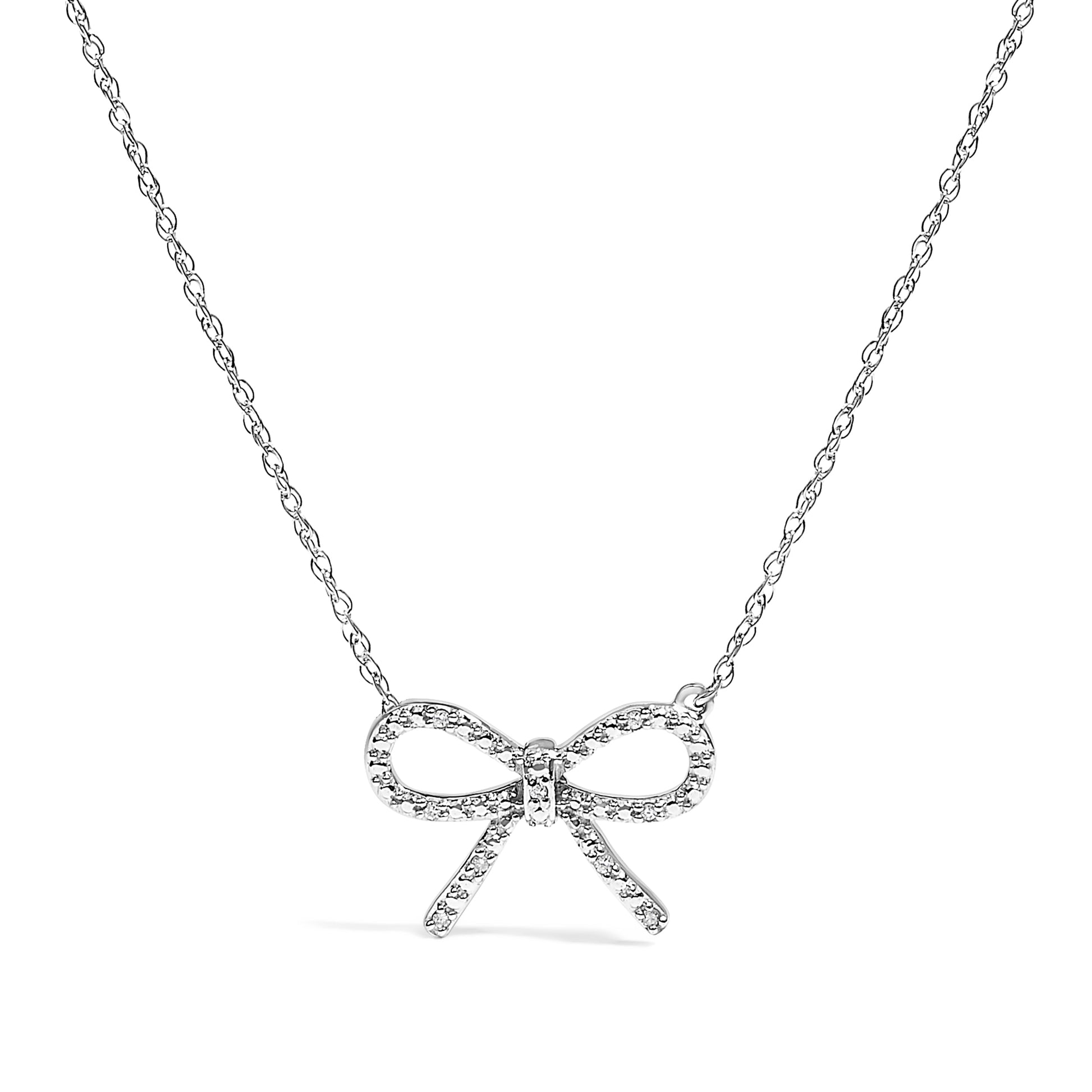 .925 Sterling Silver Diamond Accent Ribbon Bow Knot Pendant Necklace (J-K Color, I2-I3 Clarity) - 18" Inches Bids.com