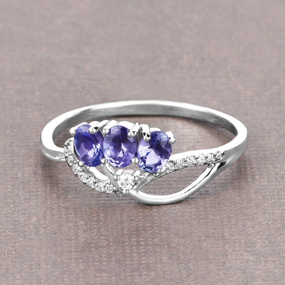 0.56 Carat Genuine Tanzanite and White Diamond 14K White Gold Ring Bids.com