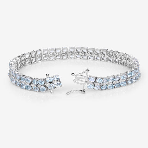 17.22 Carat Genuine Blue Topaz and White Diamond .925 Sterling Silver Bracelet Bids.com