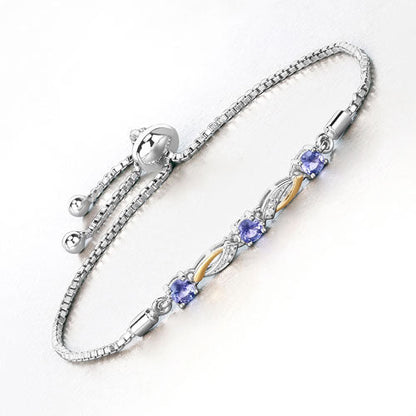0.77 Carat Genuine Tanzanite and White Sapphire .925 Sterling Silver Bracelet Bids.com