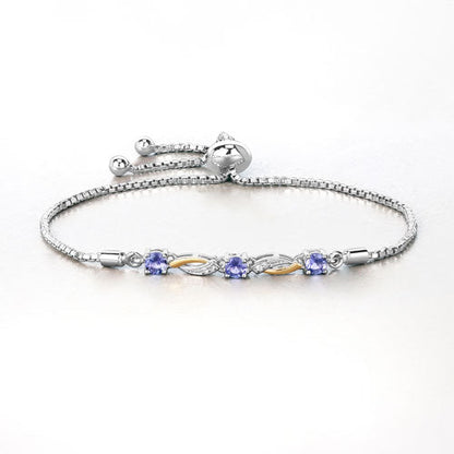 0.77 Carat Genuine Tanzanite and White Sapphire .925 Sterling Silver Bracelet Bids.com