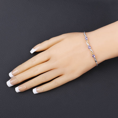0.77 Carat Genuine Tanzanite and White Sapphire .925 Sterling Silver Bracelet Bids.com