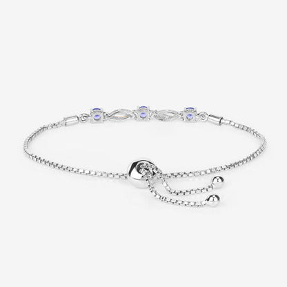 0.77 Carat Genuine Tanzanite and White Sapphire .925 Sterling Silver Bracelet Bids.com
