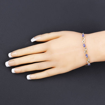 1.79 Carat Genuine Tanzanite and White Topaz .925 Sterling Silver Bracelet Bids.com
