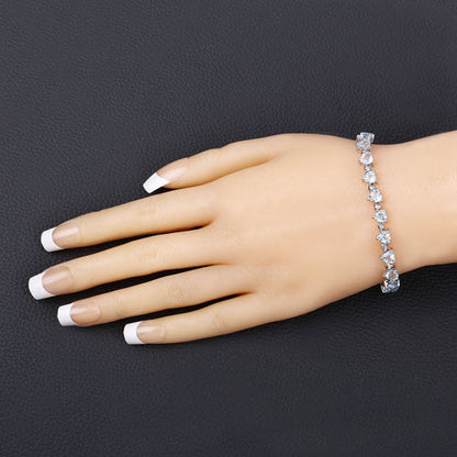 11.62 Carat Genuine Blue Topaz and White Diamond .925 Sterling Silver Bracelet Bids.com