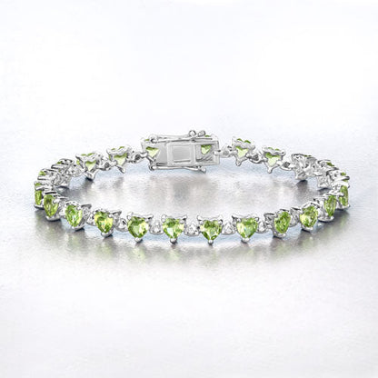 10.24 Carat Genuine Peridot and White Diamond .925 Sterling Silver Bracelet Bids.com