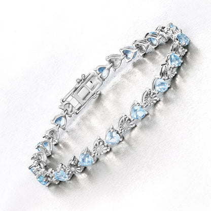 7.64 Carat Genuine Blue Topaz and White Diamond .925 Sterling Silver Bracelet Bids.com