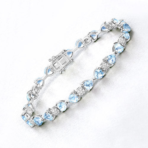 11.10 Carat Genuine Blue Topaz and White Diamond .925 Sterling Silver Bracelet Bids.com