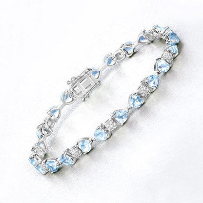 11.10 Carat Genuine Blue Topaz and White Diamond .925 Sterling Silver Bracelet Bids.com