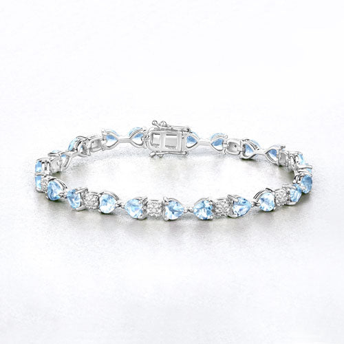 11.10 Carat Genuine Blue Topaz and White Diamond .925 Sterling Silver Bracelet Bids.com