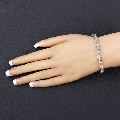 11.10 Carat Genuine Blue Topaz and White Diamond .925 Sterling Silver Bracelet Bids.com