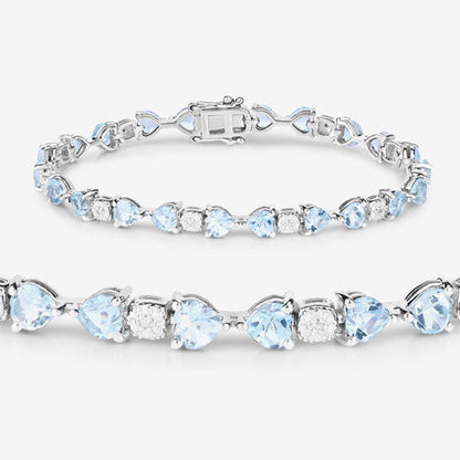 11.10 Carat Genuine Blue Topaz and White Diamond .925 Sterling Silver Bracelet Bids.com