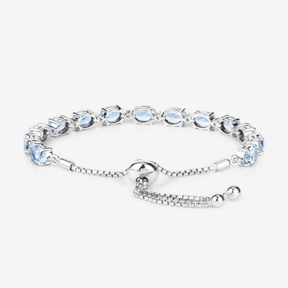 12.83 Carat Genuine Blue Topaz and White Topaz .925 Sterling Silver Bracelet Bids.com