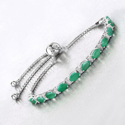 4.98 Carat Genuine Emerald and White Topaz .925 Sterling Silver Bracelet Bids.com