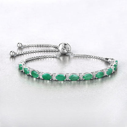 4.98 Carat Genuine Emerald and White Topaz .925 Sterling Silver Bracelet Bids.com