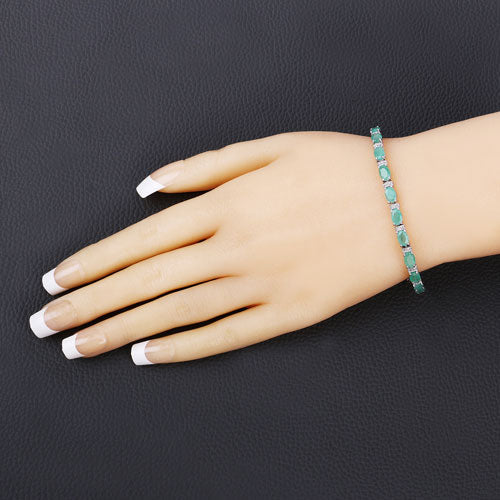 4.98 Carat Genuine Emerald and White Topaz .925 Sterling Silver Bracelet Bids.com