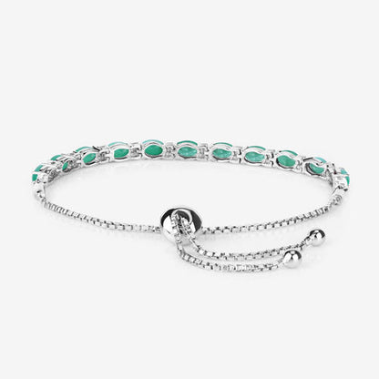 4.98 Carat Genuine Emerald and White Topaz .925 Sterling Silver Bracelet Bids.com
